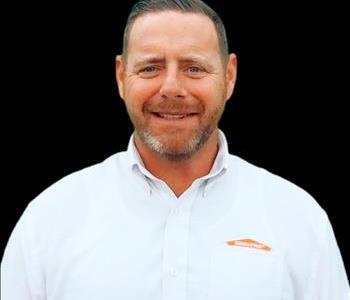 Man in white shirt, in front of black Background